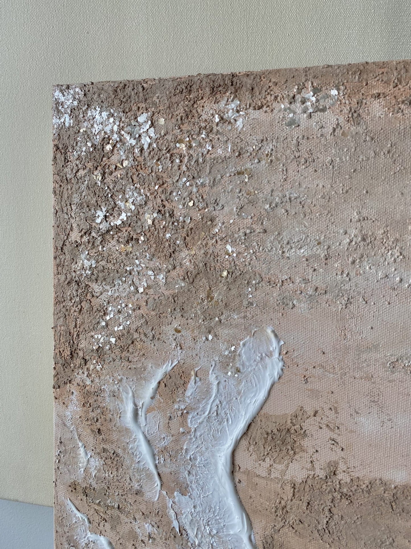 Top corner closeup view of shimmering mica flakes embedded in sandy earth textures in "Body of Water No. 4" artwork.