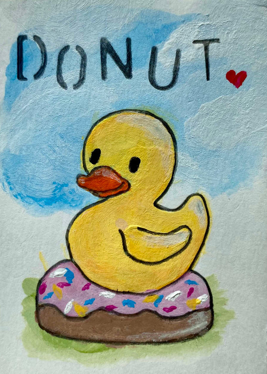 Illustration of a rubber duck on a donut with 'DONUT' text and heart on a light gray background